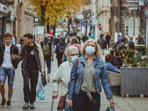 Wearing a face mask in shops became mandatory in July 2020. Photo by Tom Morbey