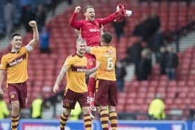 Trevor Carson links up again with Stephen Robinson after their time at Motherwell