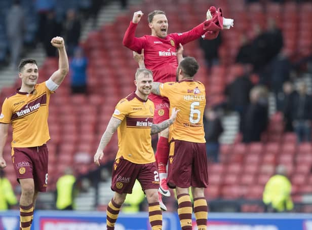 Trevor Carson links up again with Stephen Robinson after their time at Motherwell