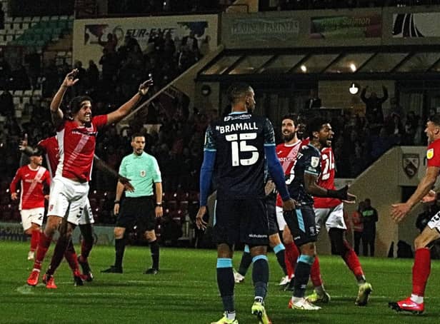 Scott Wootton celebrates scoring against Lincoln City at the end of September