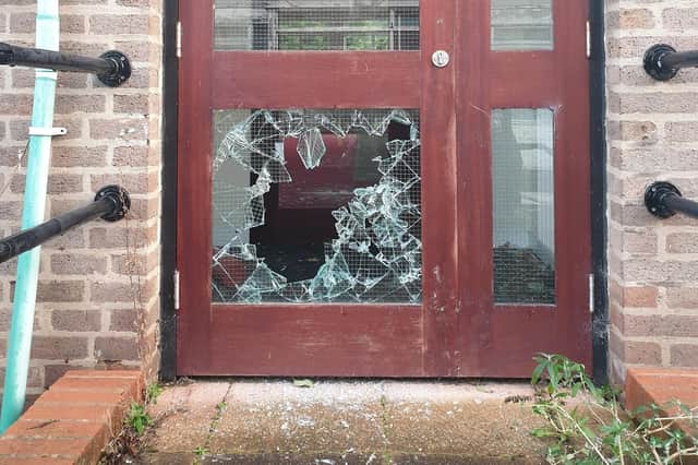 Some of the damage caused to a door on the campus.