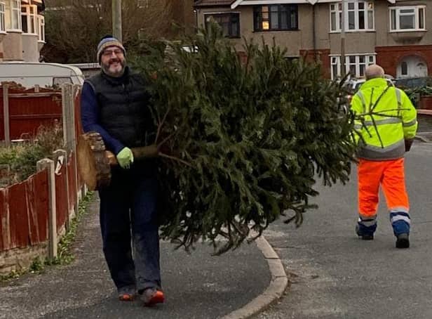 Christmas Tree Recycling volunteers at work.
