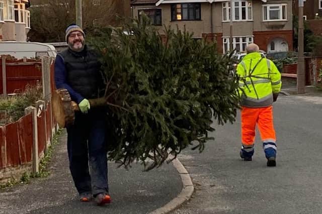 Christmas Tree Recycling volunteers at work.