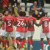 Morecambe celebrate Cole Stockton's goal during last August's win against Shrewsbury Town