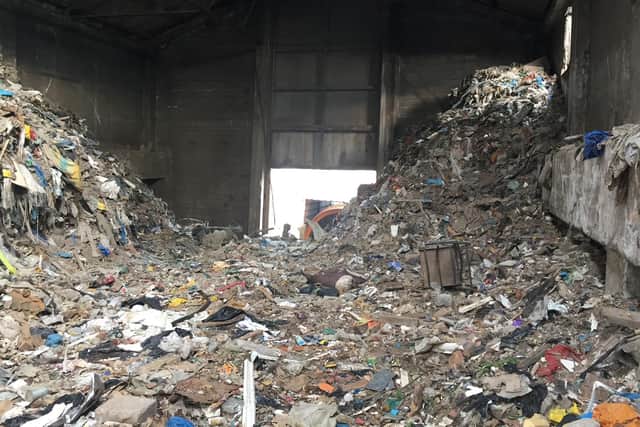 The rubbish nearly reached the ceiling of one of the buildings on the Heysham Business Park site. W2R cleared 15,000 tonnes of waste from the site. Picture courtesy of W2R.