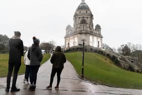 Locals watch the filming of Peaky Blinders in the Ashton Memorial.