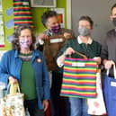 The launch of the morsbag display at the Co-op. Clare Hyde is pictured first from left.