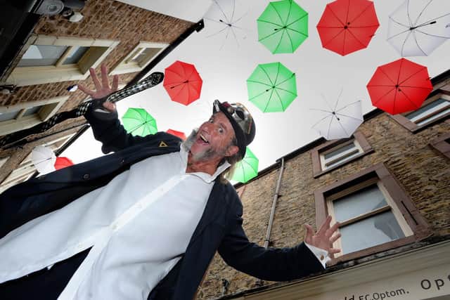 Lancaster first ever Italian Festival, Festa Italia, celebrated all things Italina from street food to Ferrari's all centred around City Museum and Market Square. One of the show compare's, Martin Houghton under the umbrella display. Picture by Paul Heyes, Sunday September 09, 2018.