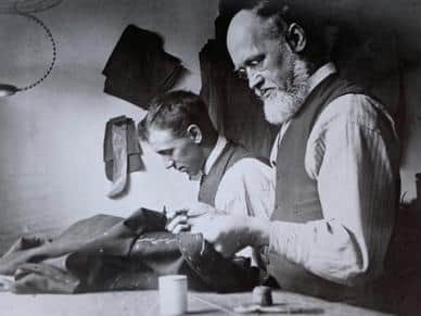 Tailor's workshop, Roeburn House, Main Street, Wray, circa 1910. Richard Kenyon is working with his son, Ronald Kenyon, in their workshop which was situated in the basement of Roseburn House. Sadly, Ronald died only a few years after this photograph was taken, catching tuberculosis in 1914 at the age of 22. Picture courtesy of David Kenyon.