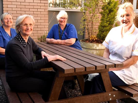 Dental nurse Julie Atkin, receptionist Hilary Freedman, dental nurse Anne Hughes and senior dental nurse Cecily Pike are pictured enjoying the new outdoor furniture at the Maxillofacial Department at Royal Lancaster Infirmary.