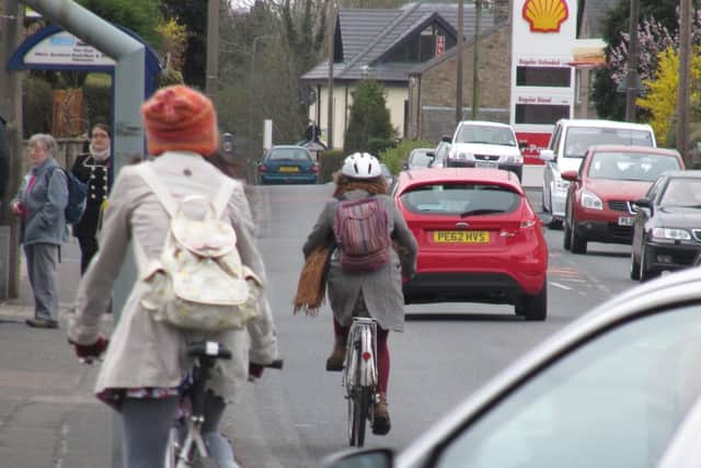 Lancaster cyclists and pedestrians are receiving "shoddy treatment" from Lancashire County Council, according to city campaign group Dynamo.