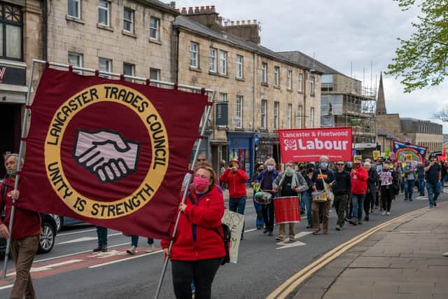 Marchers pass Dalton Square during the Lancaster & Morecambe TUC May Day Rally in Lancaster on Saturday, May 1 protesting at the Government's wide-ranging new policing bill.