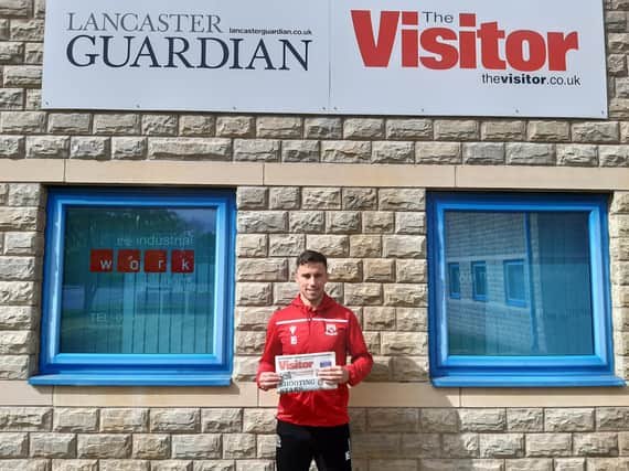 Morecambe midfielder John O'Sullivan at the Visitor office ahead of this weekend's crucial match.