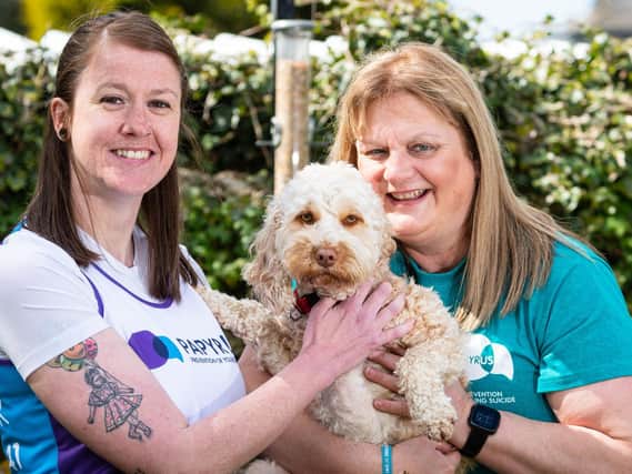 Jo Towers (right) with Stacey Agnew and Jo's cockapoo Micha.