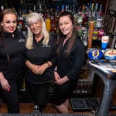 Caitlin Povey, Teresa Winward, and Rayanne Stockton working at The Lord Nelson.