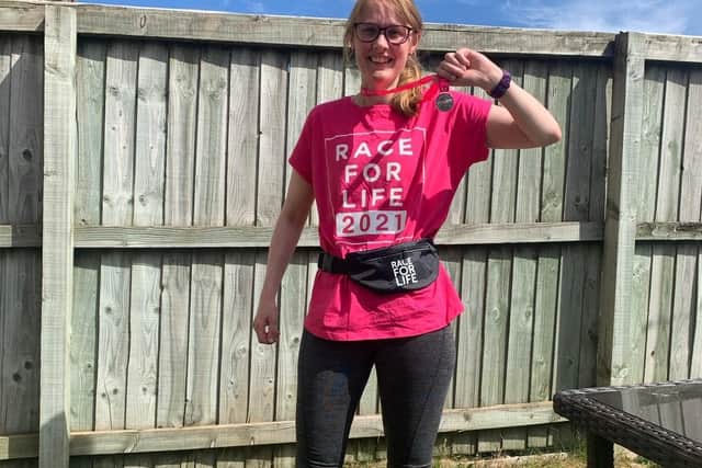 Cat Smith after running 5K and raising money in Race for Life, the first ever run she has taken part in.
