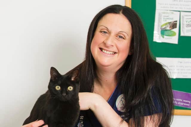 Clare Burrows, veterinary nurse who has achieved ISFM Advanced Feline Behaviour for Veterinary Professionals with her cat eleven year old Mille, a black moggie, at Lancaster Vets, Bowerham Road, Lanercost; Wednesday 19th May 2021JENNY WOOLGAR PHOTOGRAPHY