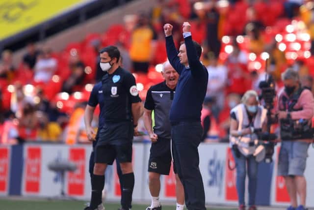 Derek Adams celebrates promotion as the final whistle sounds at Wembley