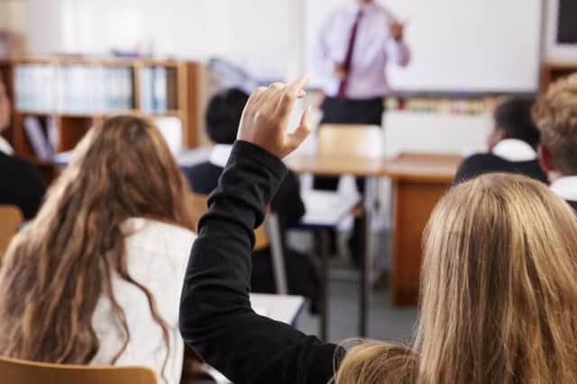 Should Lancashire's school pupils stay at home for another week after half term?