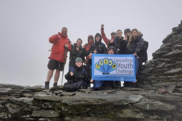 Lancashire Youth Challenge's young people and staff on a pre-pandemic Coniston Challenge, one of the many activities supported by volunteers which has helped them to win The Queen's Award.