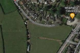 The parcel of land overlooked by houses on Rydal Road in Bolton-le-Sands is to be sold, villagers have learned. Picture from Google Street View.