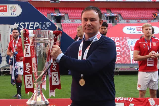Derek Adams guided Morecambe to promotion on Monday
