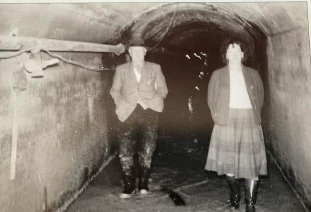 Photograph taken somewhere in Quernmore of the interior of the Thirlmere Aqueduct when repairs were taking place. The people inside the aqueduct are the late Mr and Mrs Fred Downham from Galgate. When the Downhams went down into the aqueduct, health and safety would not be important, they probably went down when the workmen had finished work for the day.