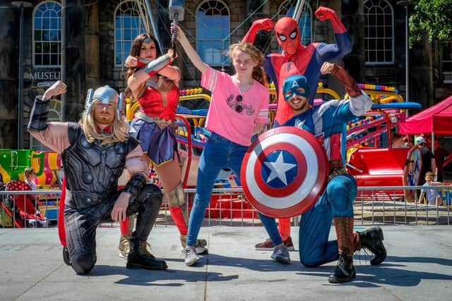 Lancaster Superhero event in Market Square. Anya McGinn of Lancaster joins in the fun. Picture by Martin Bostock.