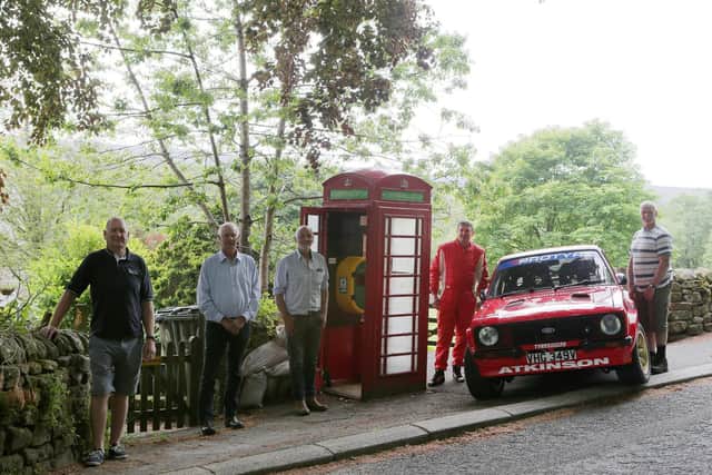 Pictured (from left) Mark Hothersall, Parish Councillors John Drinkall and Mark Atkinson, rally driver Darren Atkinson, and Parish Councillor Barry Pye by the new defibrillator          Photo: www.pro-rally.co.uk