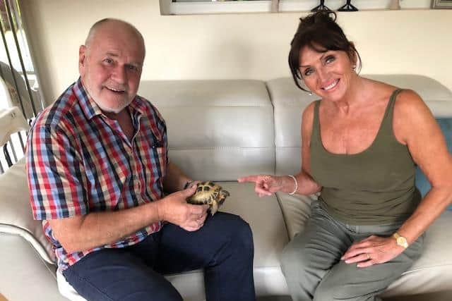 Liz and Stephan Ashby with their beloved pet tortoise, Tom