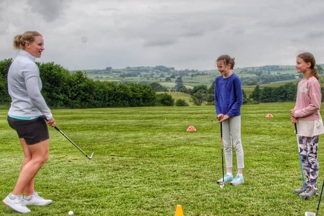PGA Trainee Professional Ellie Broome teaching juniors at Kirkby Lonsdale Golf Club.