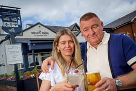Publicans Tony Davies and Zoe Shelmerdine pictured outside the Birley Arms