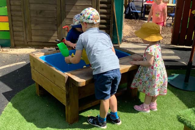 Youngsters enjoy the play area at Cawthorne's Endowed Primary School.