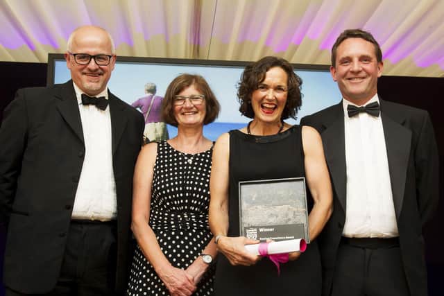 Susannah at the Cumbria Tourism awards ceremony, pictured (second right) with Nick Brelsford, Sue Edlington and Tony Johns, collecting an award as winners of the Tourism Experience of the Year 2017 for the Bay Cycle Way. Photo credit: Jenny Woolgar