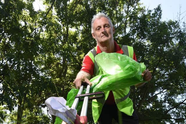 David Pierce volunteers to do litter picking in the community round Kingsway, Heysham. Photo Neil Cross.