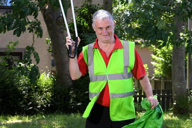 David Pierce volunteers to do litter picking in the community round Kingsway, Heysham. Photo: Neil Cross.