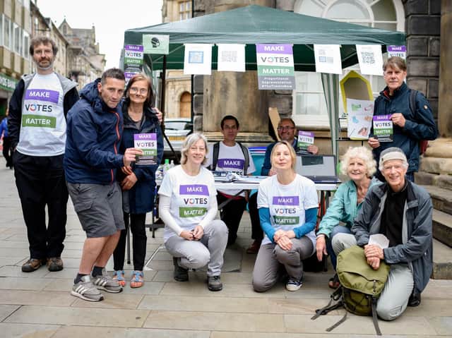 The protest against government plans for a First Past the Post voting system - Market Square Lancaster, where there was a petition to sign and participants took part in a noisy protest at noon. Pictured from left: David Burton, Nick Anderton, Jane Pullen, Anne Margaret Smith, Colette Bain, Mollie Foxall, Tim Dant, Nick Derricourt and Andy Chapple.