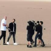 World boxing champion Tyson Fury being interviewed on Morecambe beach by former Manchester United star Gary Neville for new YouTube sports show The Overlap. Pic: Ian Lane