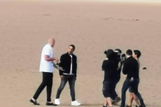 World boxing champion Tyson Fury being interviewed on Morecambe beach by former Manchester United star Gary Neville for new YouTube sports show The Overlap. Pic: Ian Lane