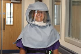 UHMBT matron Sally Young models one of the Morecambe Bay Hoods.