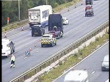 The lorry cab broke down in the third lane at around 11.30am, between junctions 21A (Croft Interchange, M62) and 21 (Woolston, Warrington), prompting police and Highways patrols to rush to the scene to help the driver. Pic: Highways