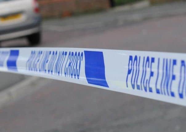 A man was arrested on suspicion of causing death and serious injury by dangerous driving following a fatal collision near Lancaster.