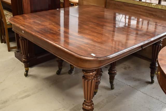 A 14ft family dining table, made by a Lancaster firm, sold for £10,800 at 1818 Auctioneers.