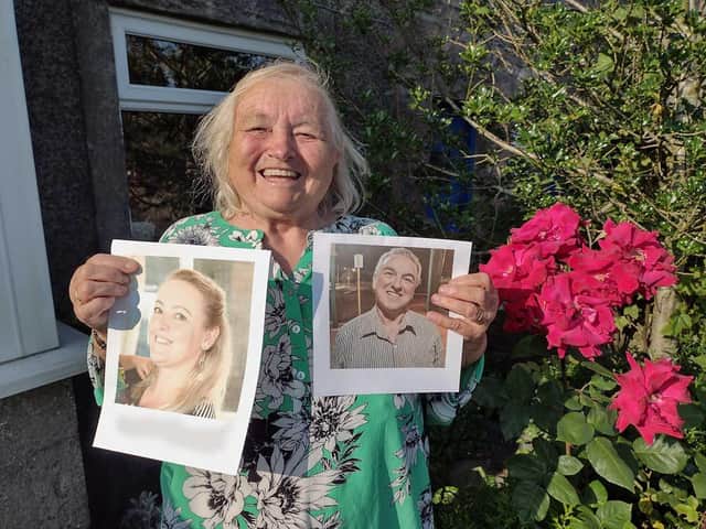 Issy with photos of her newly-found son Keith and granddaughter Kym. Photo by Angela Bowskill