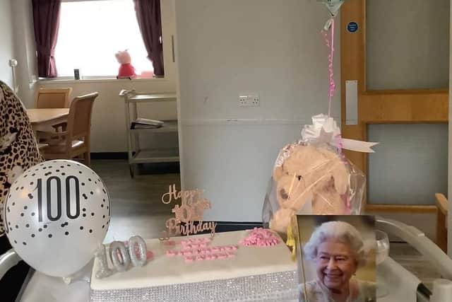 A massive celebratory cake and congratulatory card from the Queen