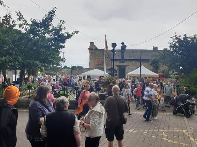 Crowds enjoying Carnforth's first street festival.