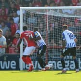 Morecambe score the only goal of the game