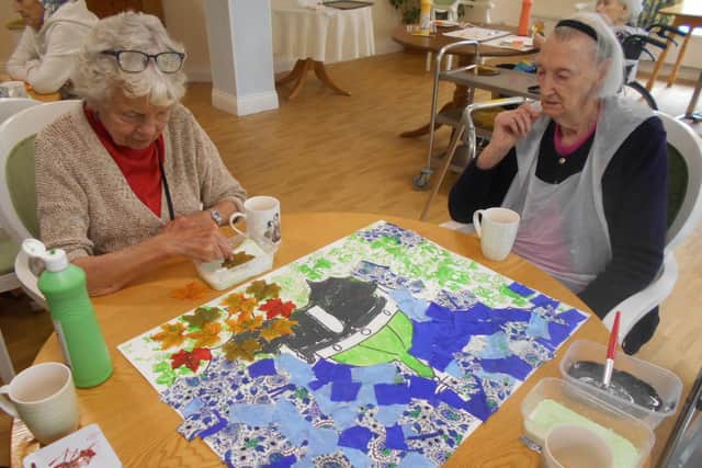 Residents at Laurel Bank care home getting crafty for a collage competition for the Lancaster Health Festival.
