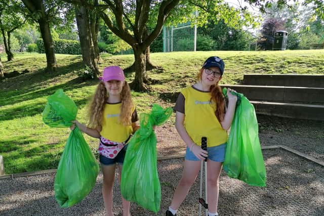 Brownies help with a litter pick and clean up