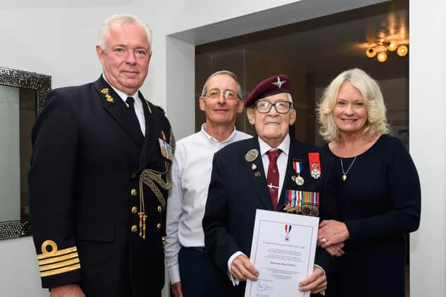 Captain RNLN Gerit Nijenhuis, Defence and Naval Attache, Embassy of the Kingdom of the Netherlands, Jack's son-in-law Phil Shelling, Jack Bracewell and his daughter Lynne Shelling celebrate his award. Photo: Kelvin Stuttard